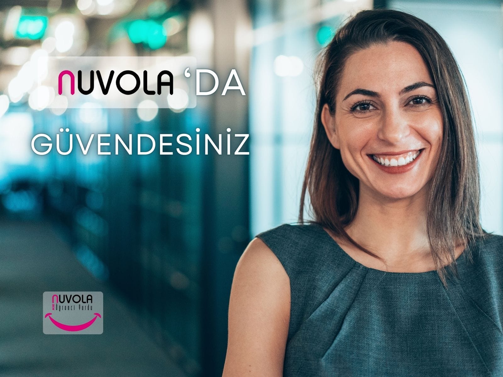 ofis içerisinde gülümseyen kadın görseli geri planda. Önce Nuvola logosu ve 'da güvendesiniz yazısı